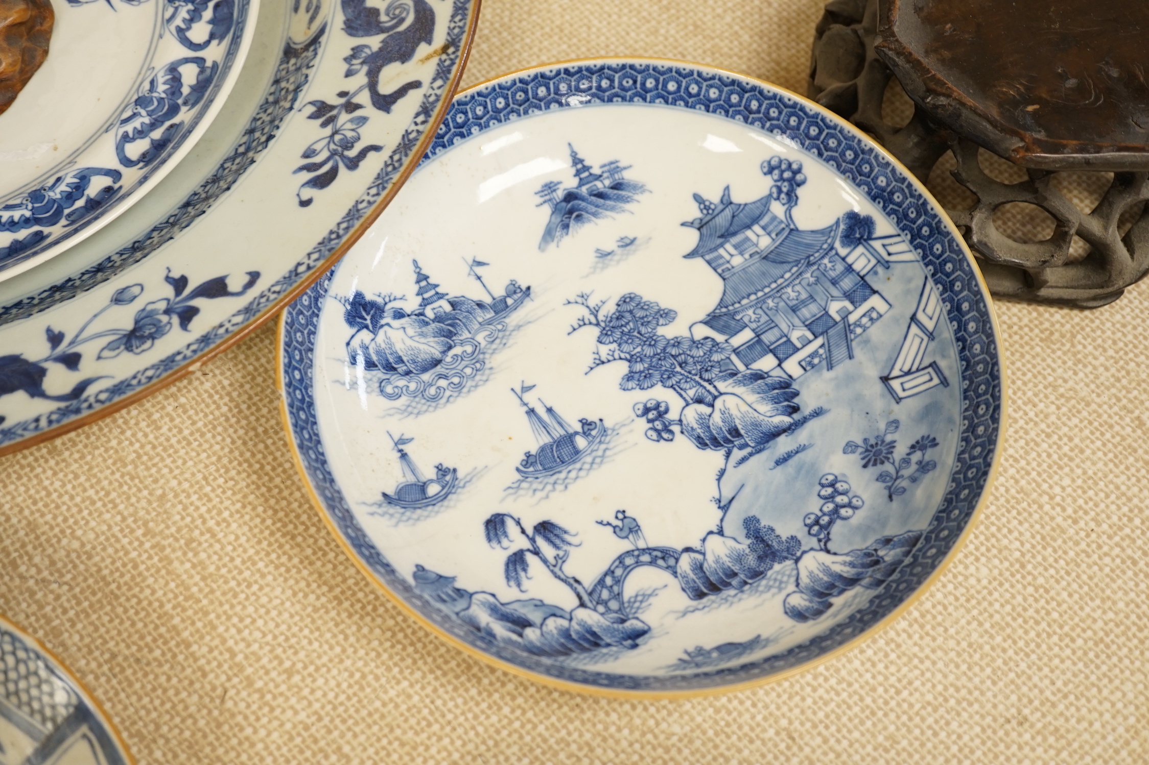 A large collection of Chinese blue and white export plates, a blanc de chine figure, two vases, a jar and five Japanese planters, jar 24cm high (a.f.)